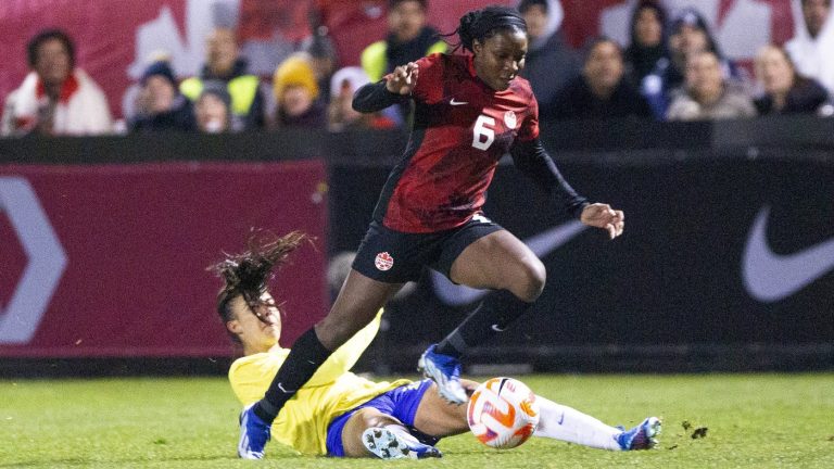 The inaugural CONCACAF W Gold Cup will be held next year in Houston, Los Angeles, San Diego and Carson, Calif., CONCACAF announced Tuesday. Canada's Deanne Rose gets past Brazil's Lauren during second half soccer action in Halifax, N.S., on Tuesday, October 31, 2023. (Ron Ward/CP)