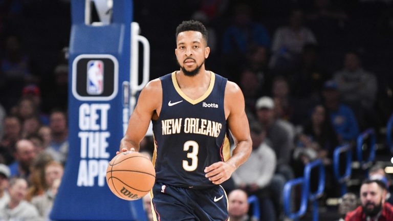 New Orleans Pelicans guard CJ McCollum pushes down the court in the second half of an NBA basketball game against Oklahoma City Thunder, Wednesday, Nov. 1, 2023, in Oklahoma City. (Kyle Phillips/AP)