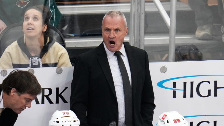 Minnesota Wild head coach Dean Evason, center, gives instructions during the first period of an NHL hockey game against the Pittsburgh Penguins in Pittsburgh, Thursday, April 6, 2023. (Gene J. Puskar/AP)