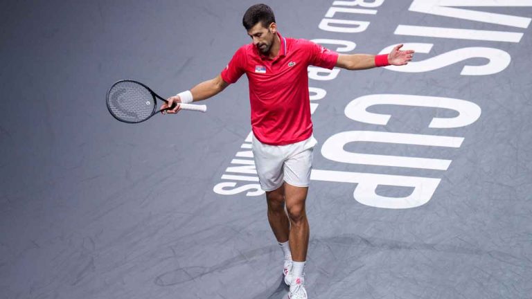 Novak Djokovic of Serbia reacts during his match against Jannik Sinner of Italy during a Davis Cup semi-final tennis match between Italy and Serbia. (Manu Fernandez/AP)