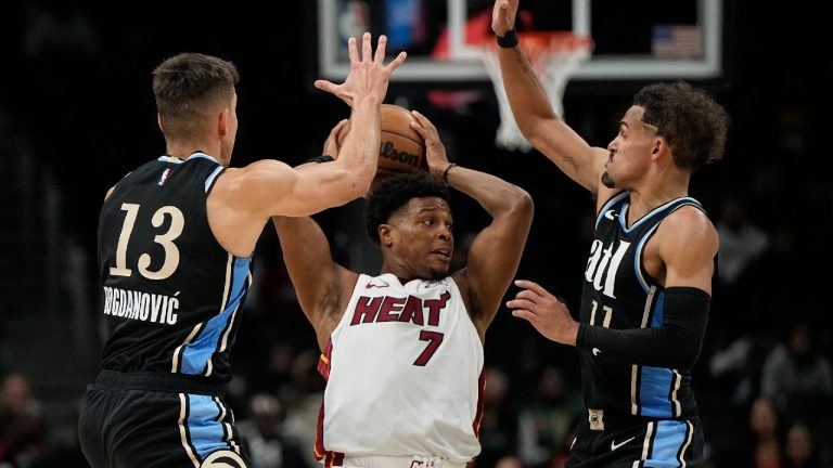 Miami Heat guard Kyle Lowry (7) works against the Atlanta Hawks during the second half of an NBA basketball game, Saturday, Nov. 11, 2023, in Atlanta. The Miami Heat won 117-109. (Mike Stewart/AP)