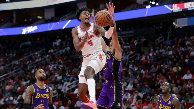 Houston Rockets guard Jalen Green (4) drive up a shot past Los Angeles Lakers guard Max Christie, center right, as guard D'Angelo Russell (1) and forward Taurean Prince (12) look on during the second half of an NBA basketball game. (Michael Wyke/AP)