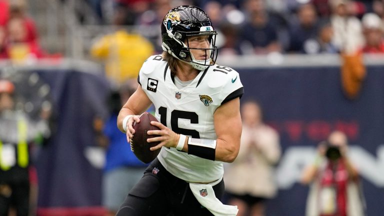 Jacksonville Jaguars quarterback Trevor Lawrence (16) throws a pass in the first half of an NFL football game against the Houston Texans in Houston, Sunday, Nov. 26, 2023. (Eric Gay/AP)