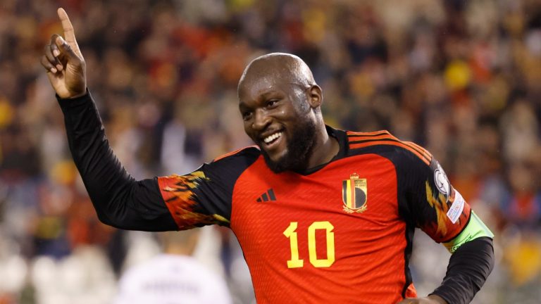 Belgium's Romelu Lukaku, right, celebrates after scoring his sides third goal during the Euro 2024 group F qualifying soccer match between Belgium and Azerbaijan at the King Baudouin stadium in Brussels, Sunday, Nov. 19, 2023. (Geert Vanden Wijngaert/AP)