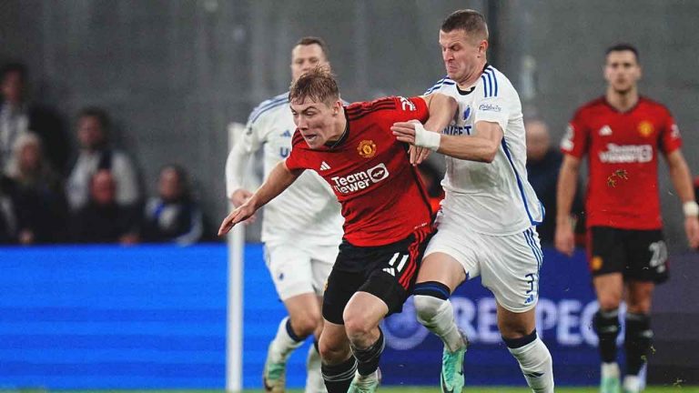 FC Copenhagen's Denis Vavro, right, and Manchester United's Rasmus Hojlund, left, challenge for the ball during the Champions League Group A soccer match between FC Copenhagen and Manchester United in Copenhagen. (Liselotte Sabroe/AP)
