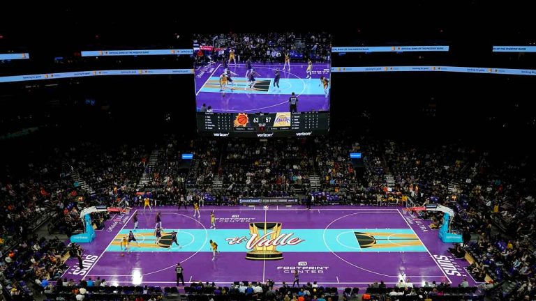 The Los Angeles Lakers and the Phoenix Suns compete during the during the second half of an NBA basketball in-season tournament. (Matt York/AP)