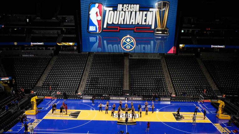 Denver Nuggets cheerleaders practice on the new floor installed for the league's in-season tournament. (David Zalubowski/AP)