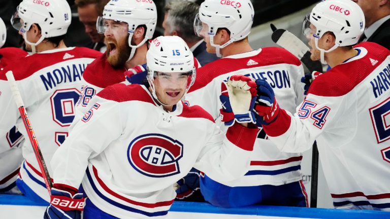 Montreal Canadiens' Alex Newhook (15) celebrates his goal against the Toronto Maple Leafs with teammates during second period NHL hockey action in Toronto on Wednesday, October 11, 2023. (Frank Gunn/CP)