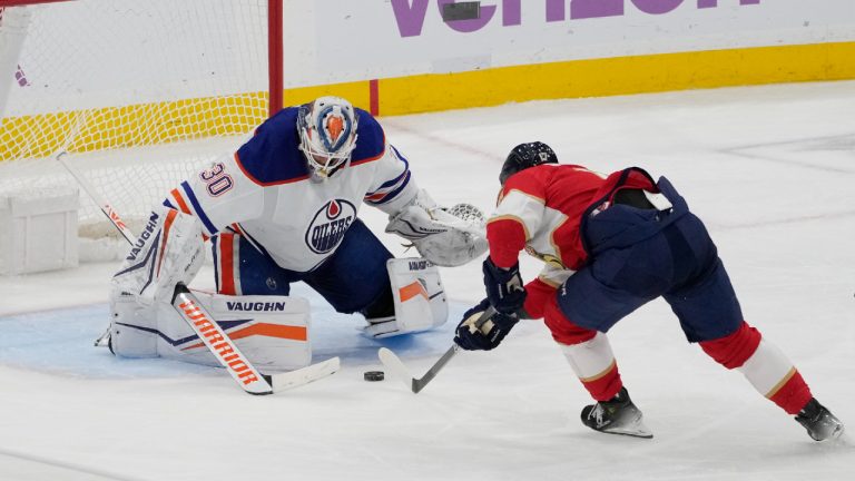 Florida Panthers center Evan Rodrigues (17) aims a shot as Edmonton Oilers goaltender Calvin Pickard (30) defends the net during the third period of an NHL hockey game, Monday, Nov. 20, 2023, in Sunrise, Fla. (Marta Lavandier/AP)