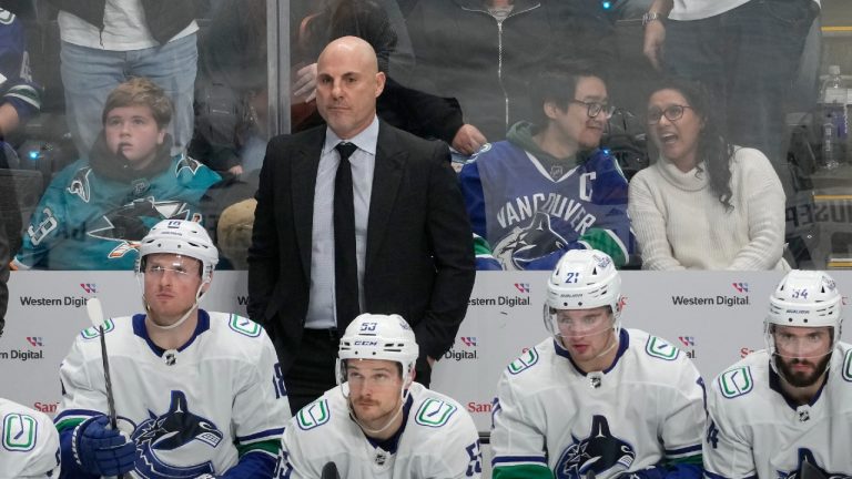 Vancouver Canucks head coach Rick Tocchet watches during an NHL hockey game against the San Jose Sharks in San Jose, Calif., Saturday, Nov. 25, 2023. (Jeff Chiu/AP)