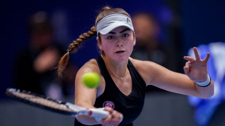 Canada's Marina Stakusic returns the ball to Spain's Rebeka Masarova during their group stage tennis match between Spain and Canada on the second day of the Billie Jean King Cup finals at La Cartuja stadium in Seville, southern Spain, Wednesday, Nov. 8, 2023. (Manu Fernandez/AP Photo)