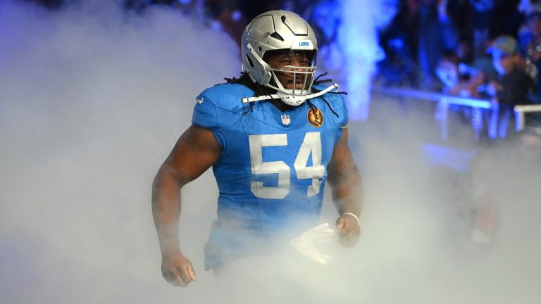 Detroit Lions defensive tackle Alim McNeill is introduced before the first half of an NFL football game against the Green Bay Packers, Thursday, Nov. 23, 2023, in Detroit. (AP Photo/David Dermer)