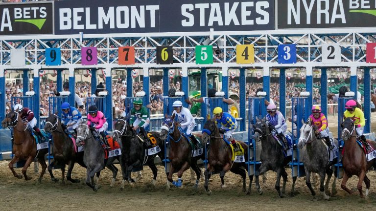 Horses break from the gate at the start of the Travers Stakes horse race at Saratoga Race Course in Saratoga Springs, Aug. 27, 2016 (Hans Pennink/AP)