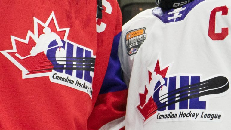 Team Red and Team White logos are shown following the CHL Top Prospects Game. (Peter Power/CP)