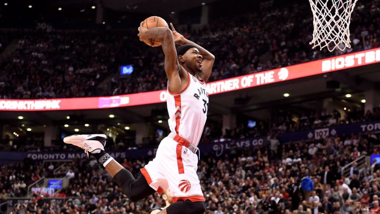 Toronto Raptors' Terrence Ross soars with the ball for a dunk through the Brooklyn Nets' net during second half NBA basketball action, in Toronto, on Monday, Jan. 18, 2016. (Frank Gunn/CP)