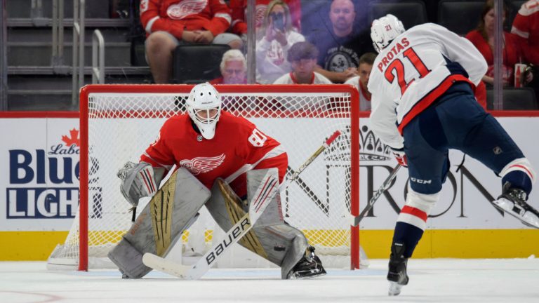 Washington Capitals centre Aliaksei Protas (21) fails to get a shot past Detroit. Red Wings goaltender Michael Hutchinson (80) during a practice shootout after a preseason NHL hockey game in Detroit, Saturday, Sept. 30, 2023. (David Guralnick/AP) 