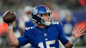 New York Giants quarterback Tommy DeVito (15) passes against the New England Patriots during the fourth quarter of an NFL football game, Sunday, Nov. 26, 2023, in East Rutherford, N.J. (Seth Wenig/AP)