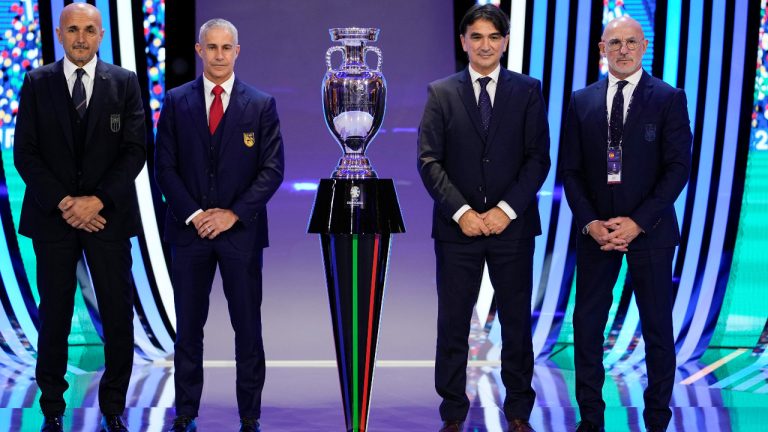 From left: The head coaches fron Italy Luciano Spalletti, Albania Sylvio Mendes De Campo Sylvinho, Croatia Zlatko Dalic and Spain Luis de la Fuente pose next to the trophy after the draw for the UEFA Euro 2024 soccer tournament finals in Hamburg, Germany, Saturday, Dec. 2, 2023. (Martin Meissner/AP) 