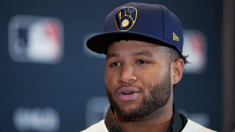 Milwaukee Brewers outfielder Jackson Chourio responds to questions following a news conference at the Major League Baseball winter meetings Monday, Dec. 4, 2023, in Nashville, Tenn. Chourio agreed to the largest contract for a player with no major league experience, an $82 million, eight-year deal with the Brewers. (George Walker IV/AP)