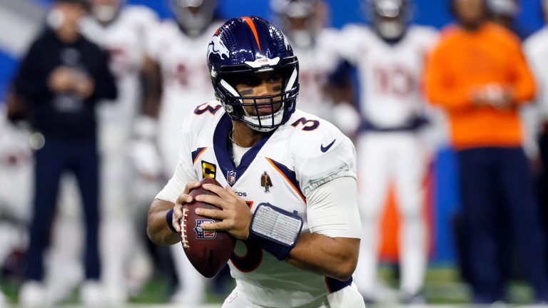 Denver Broncos quarterback Russell Wilson looks downfield during the first half of an NFL football game against the Detroit Lions, Saturday, Dec. 16, 2023, in Detroit. (Duane Burleson/AP)