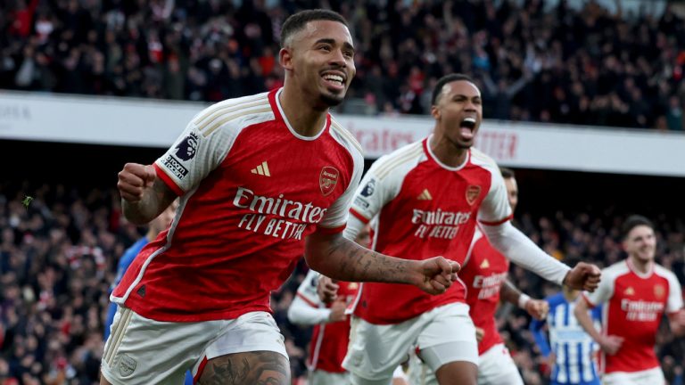 Arsenal's Gabriel Jesus, left, celebrates after scoring the opening goal during the English Premier League soccer match between Arsenal and Brighton and Hove Albion at the Emirates Stadium in London, Sunday, Dec. 17, 2023. (Ian Walton/AP) 