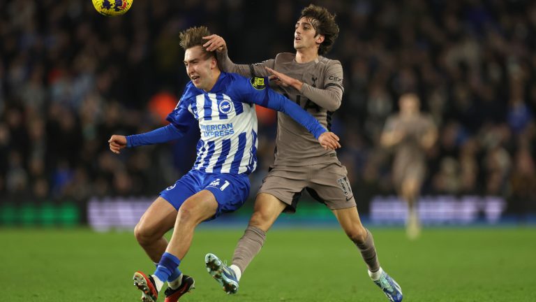 Brighton's Jack Hinshelwood, left, and Tottenham's Bryan Gil battle for the ball during the English Premier League soccer match between Brighton & Hove Albion and Tottenham Hotspur at the Amex stadium in Brighton, England, Thursday, Dec. 28, 2023. (Ian Walton/AP) 