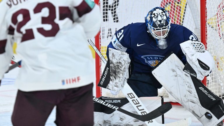 Finland's goalkeeper Noa Vali, right, in action during the IIHF World Junior Championship group A ice hockey match between Latvia and Finland at Scandinavium in Gothenburg, Sweden Friday, Dec. 29, 2023. (Björn Larsson Rosvall/TT News Agency via AP)