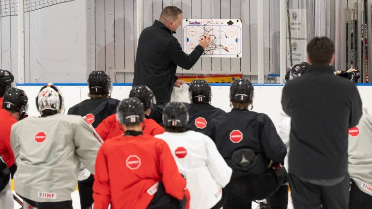 Canada assistant coach Gilles Bouchard goes over plays during a practice session at the IIHF World Junior Hockey Championship in Gothenburg, Sweden, on Saturday, Dec. 30, 2023. (CP)