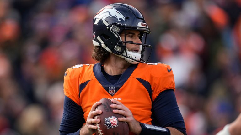 Denver Broncos quarterback Jarrett Stidham (4) looks to pass against the Los Angeles Chargers during the first half of an NFL football game, Sunday, Dec. 31, 2023, in Denver. (David Zalubowski/AP)