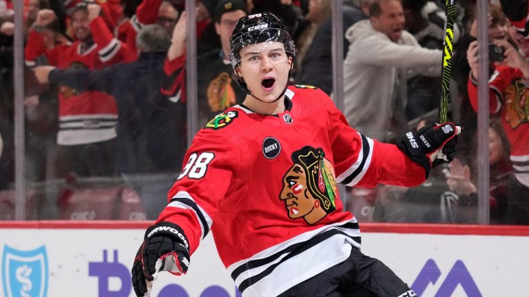 Connor Bedard of the Chicago Blackhawks celebrates after scoring the game winning goal during overtime against the Winnipeg Jets at the United Center on December 27, 2023 in Chicago, Illinois. (Patrick McDermott/Getty Images)