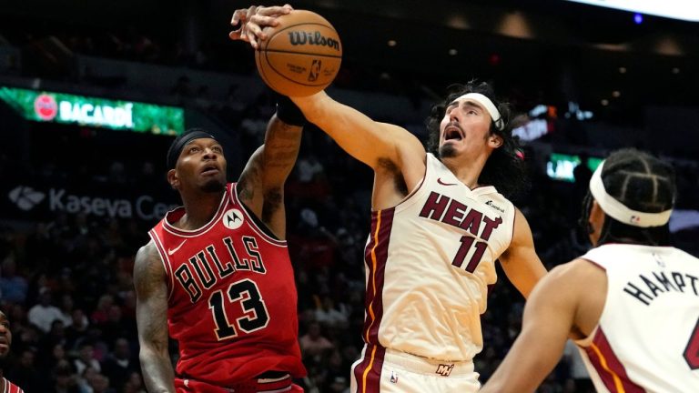 Chicago Bulls forward Torrey Craig and Miami Heat guard Jaime Jaquez Jr. go for the ball during the second half of an NBA basketball game, Thursday, Dec. 14, 2023, in Miami. (Lynne Sladky/AP Photo)