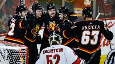 Flames use big third period to complete comeback win over Hurricanes