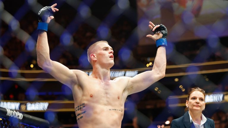 Ian Garry celebrates after defeating Neil Magny during a UFC 292 mixed martial arts fight, Saturday, August 19, 2023, in Boston. Garry won via unanimous decision. (Gregory Payan/AP)