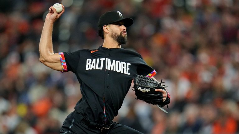 Baltimore Orioles relief pitcher Jorge Lopez throws to the Boston Red Sox in the eighth inning of a baseball game, Friday, Sept. 29, 2023, in Baltimore. (AP Photo/Julio Cortez)