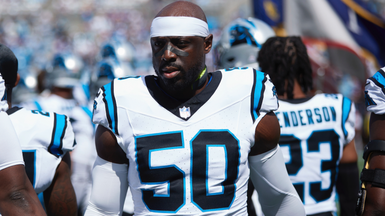 Carolina Panthers linebacker Justin Houston (50) walks to the sideline during player introductions prior to an NFL football game against the Minnesota Vikings, Sunday, Oct. 1, 2023, in Charlotte, N.C. (AP Photo/Brian Westerholt)