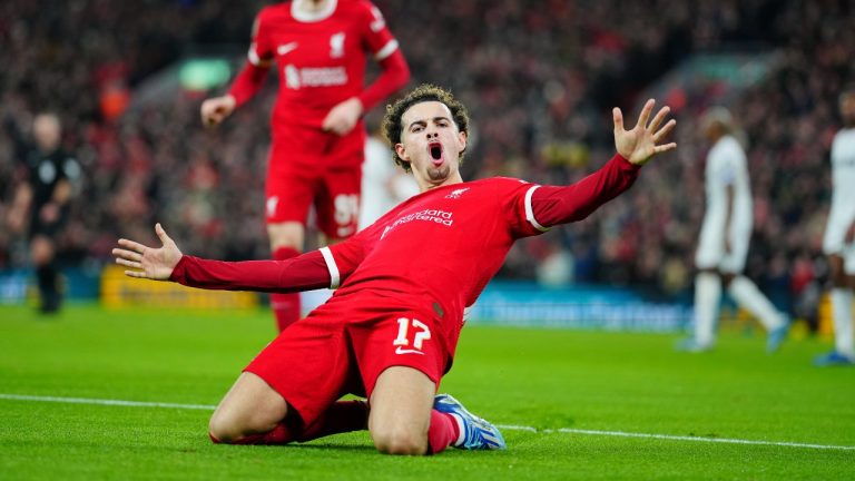 Liverpool scored twice in three minutes to beat Fulham 2-1 in the first leg of the English League Cup semifinals. (AP/Jon Super)