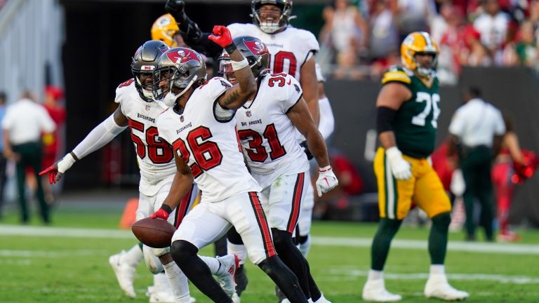 Tampa Bay Buccaneers' Logan Ryan reacts after intercepting a pass during the second half of an NFL football game against the Green Bay Packers Sunday, Sept. 25, 2022, in Tampa, Fla. (Chris O'Meara/AP Photo)