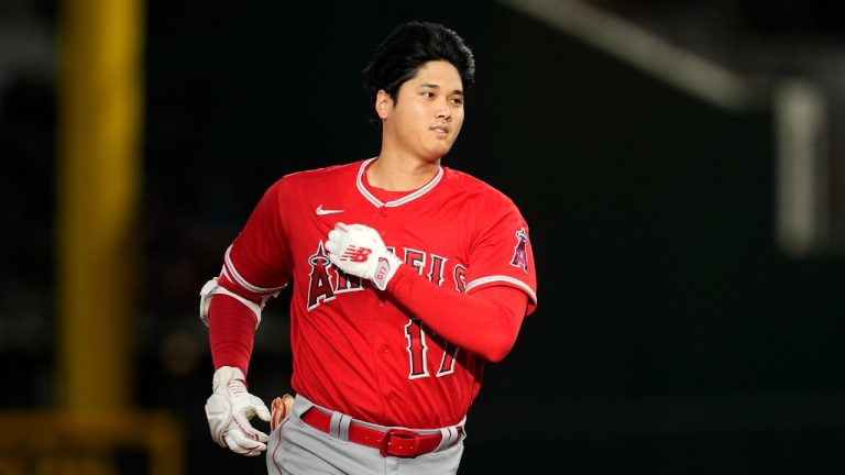 Los Angeles Angels' Shohei Ohtani rounds the bases after hitting a home run during a baseball game against the Texas Rangers, Wednesday, Aug. 16, 2023, in Arlington, Texas. (Tony Gutierrez/AP)