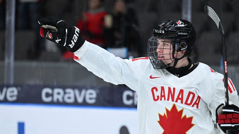 Canada's Macklin Celebrini celebrates scoring during the IIHF World Junior Championship group A ice hockey match between Latvia and Canada at Scandinavium in Gothenburg, Sweden, Wednesday, Dec. 27, 2023. (Bjorn Larsson Rosvall/TT News Agency via AP)