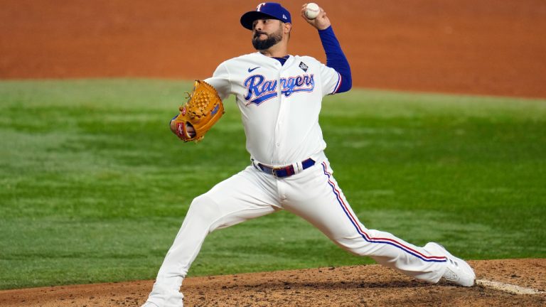 Texas Rangers pitcher Martin Perez throws against the Arizona Diamondbacks during the eighth inning in Game 2 of the baseball World Series Saturday, Oct. 28, 2023, in Arlington, Texas. (Julio Cortez/AP)