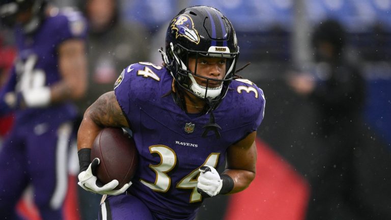 Baltimore Ravens running back Keaton Mitchell (34) warms up before an NFL football game against the Los Angeles Rams. (Nick Wass/AP)