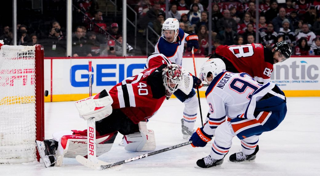 McLeod scores two goals as Oilers take down Devils