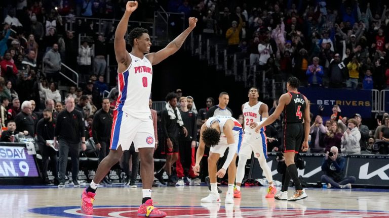 Detroit Pistons centre Jalen Duren (0) and team react after defeating the Toronto Raptors 129-127 in an NBA basketball game, Saturday, Dec. 30, 2023, in Detroit. The Pistons snapped their 28th-game losing streak and won 129-127. (Carlos Osorio/AP)