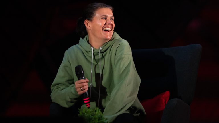 Canada's national women's soccer team captain Christine Sinclair laughs while speaking during a celebration for her retirement in Vancouver on Wednesday, Dec. 6, 2023. (Ethan Cairns/CP)