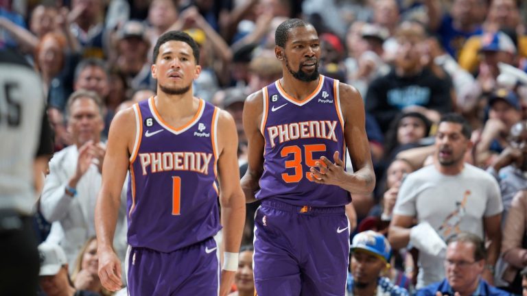 Phoenix Suns guard Devin Booker and Phoenix Suns forward Kevin Durant in the second half of Game 5 of an NBA Western Conference basketball semifinal playoff series Tuesday, May 9, 2023, in Denver. (David Zalubowski/AP Photo)