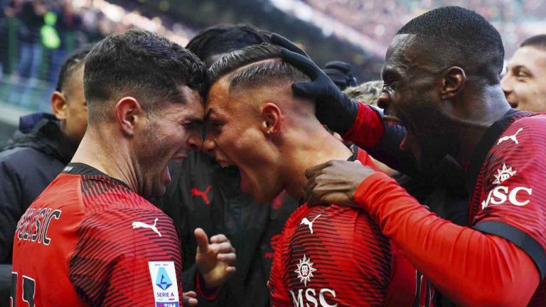 Milan's Jan Carlo Simic, centre, celebrates with teammates after scoring their side's second goal of the game during the Serie A soccer match between AC Milan and AC Monza at San Siro stadium in Milan. (Spada/AP)
