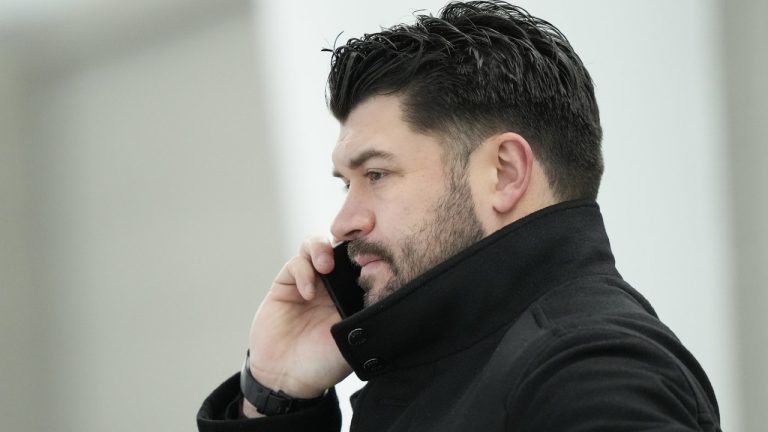 Canada's Brent Seabrook talks on the phone during Canadian World Juniors selection camp in Oakville, Ont., on Monday, Dec. 11, 2023. (Nathan Denette/CP)