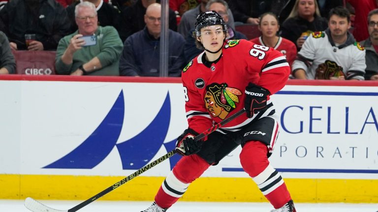 Chicago Blackhawks centre Connor Bedard handles the puck during the second period of an NHL hockey game against the Tampa Bay Lightning, Thursday, Nov. 16, 2023, in Chicago. (Erin Hooley/AP)