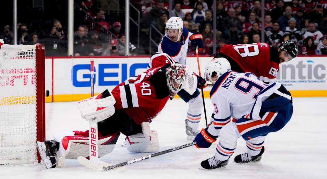 Oilers get big goals from McDavid and Draisaitl, net four in third to beat Devils