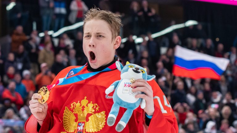 Artyom Duda of Russian Federation shows his Gold medal during Men's 6-Team Tournament Gold Medal Game between Russia and United States of the Lausanne 2020 Winter Youth Olympics on January 22, 2021 in Lausanne, Switzerland. (RvS.Media/Basile Barbey/Getty Images)
